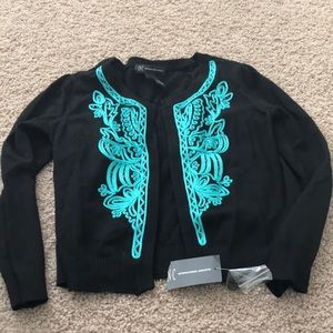 Black shrug with design